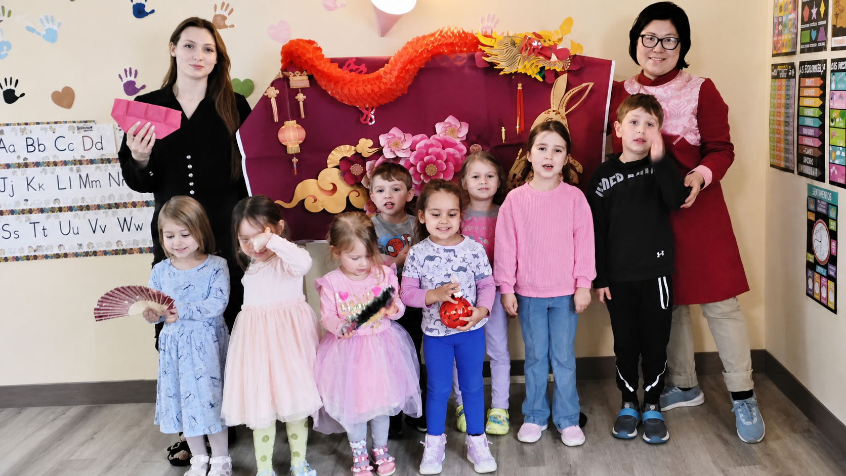 Children and teachers celebrating Chinese New Year together